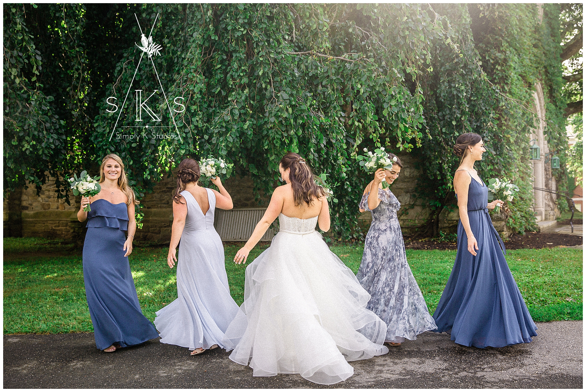  Bridesmaids twirling in their dresses 