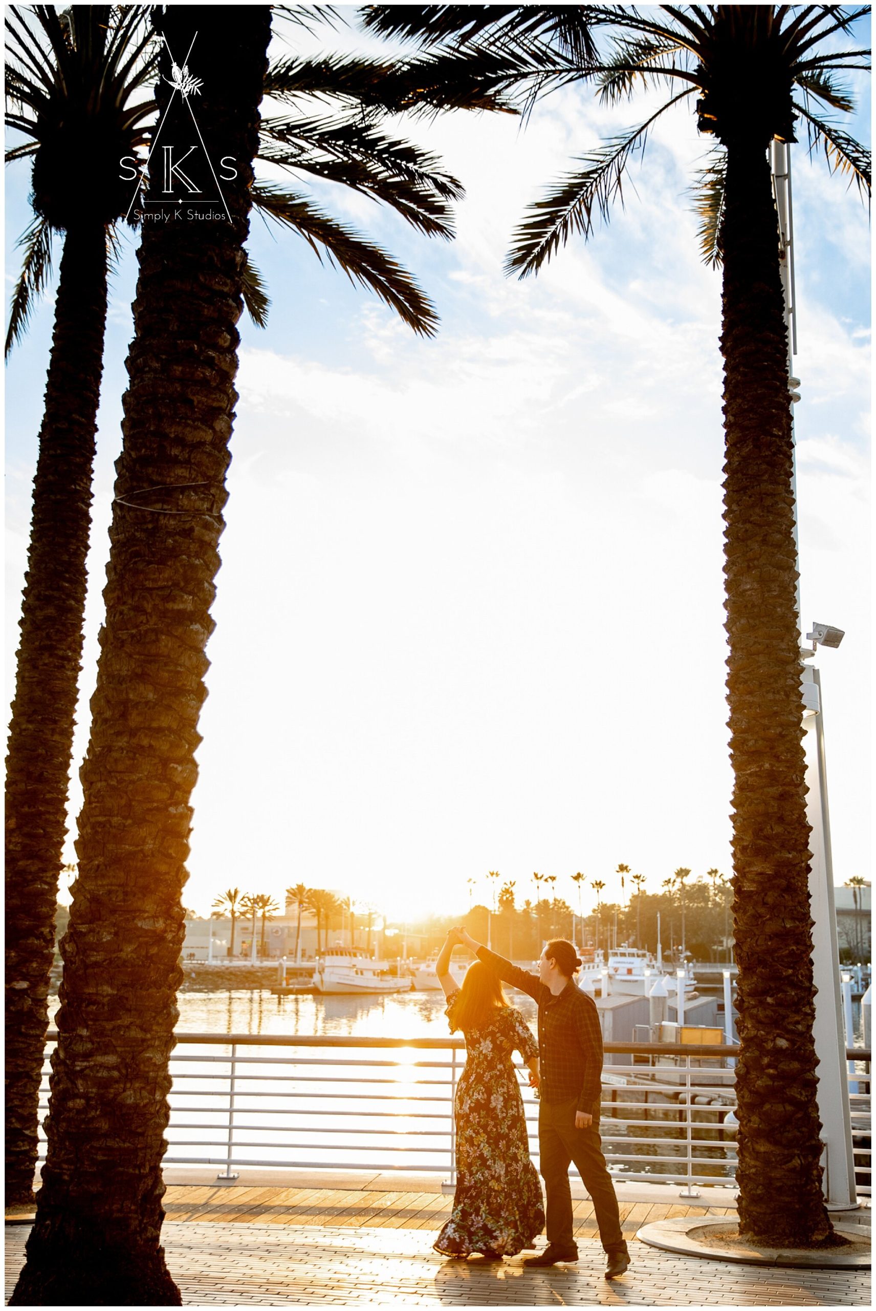  A couple dancing among palm trees 