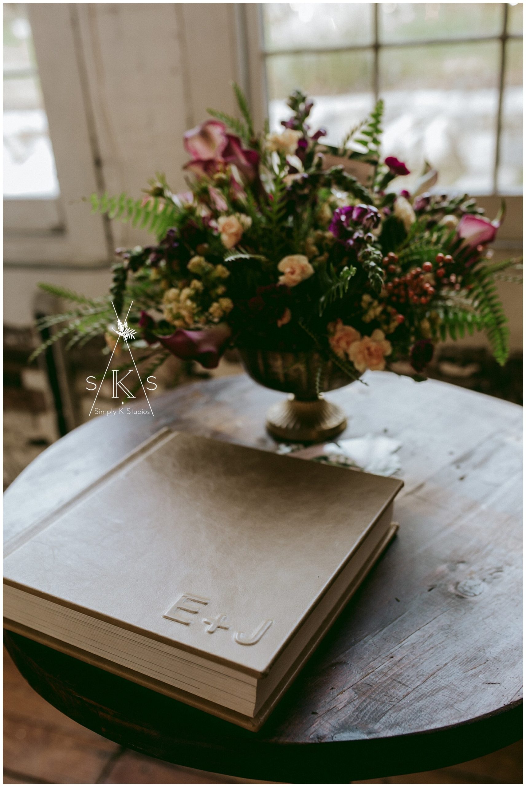 leather wedding album with a floral display 
