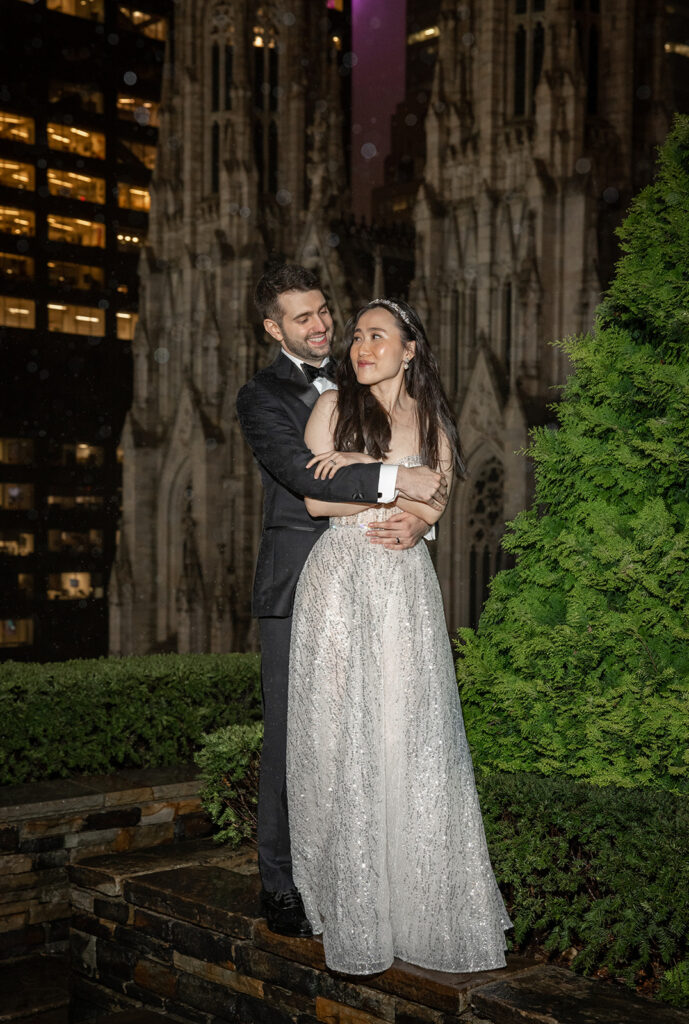 romantic nighttime rainy rooftop wedding portraits at 620 Loft and Garden