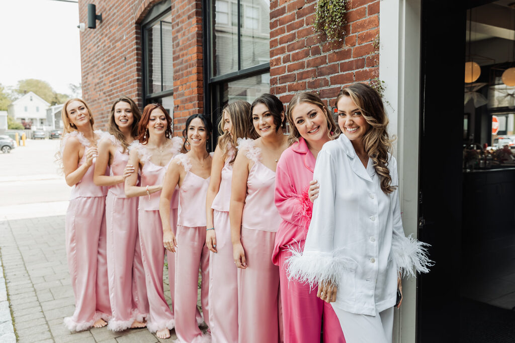 bride and bridesmaids in cute satin PJs before the big day