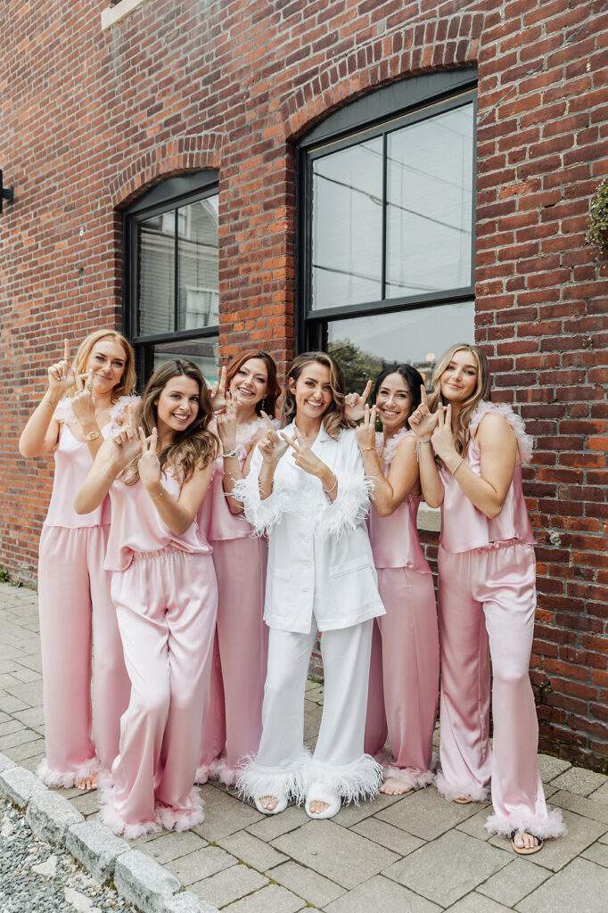 bride and bridesmaids in cute satin PJs before the big day