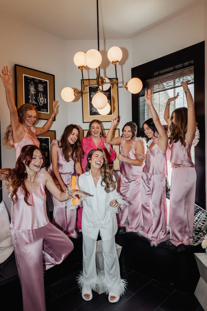 bride and bridesmaids in cute satin PJs before the big day