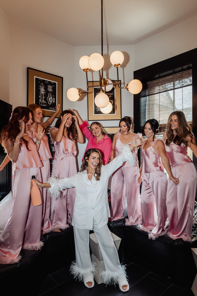 bride and bridesmaids in cute satin PJs before the big day