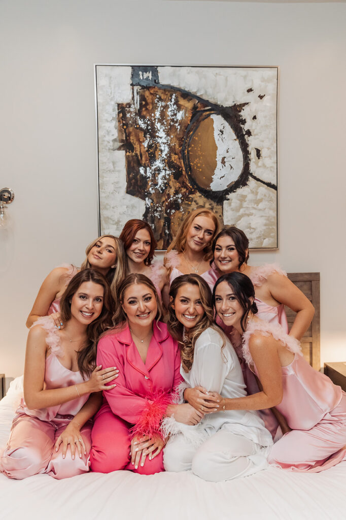 bride and bridesmaids in cute satin PJs before the big day