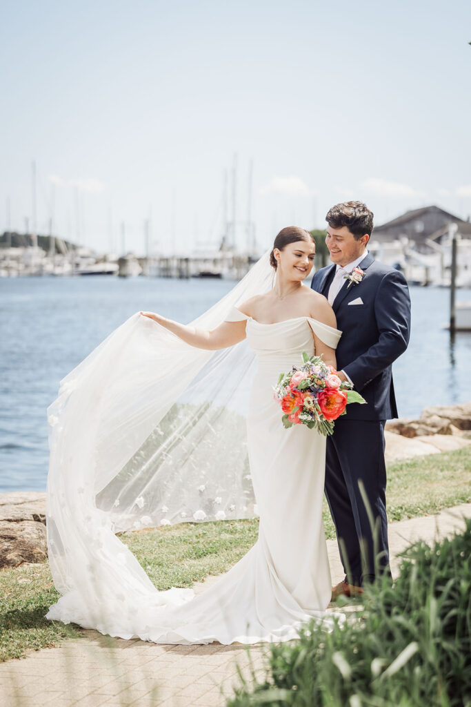 elegant waterfront bride and groom during their downtown mystic ct wedding