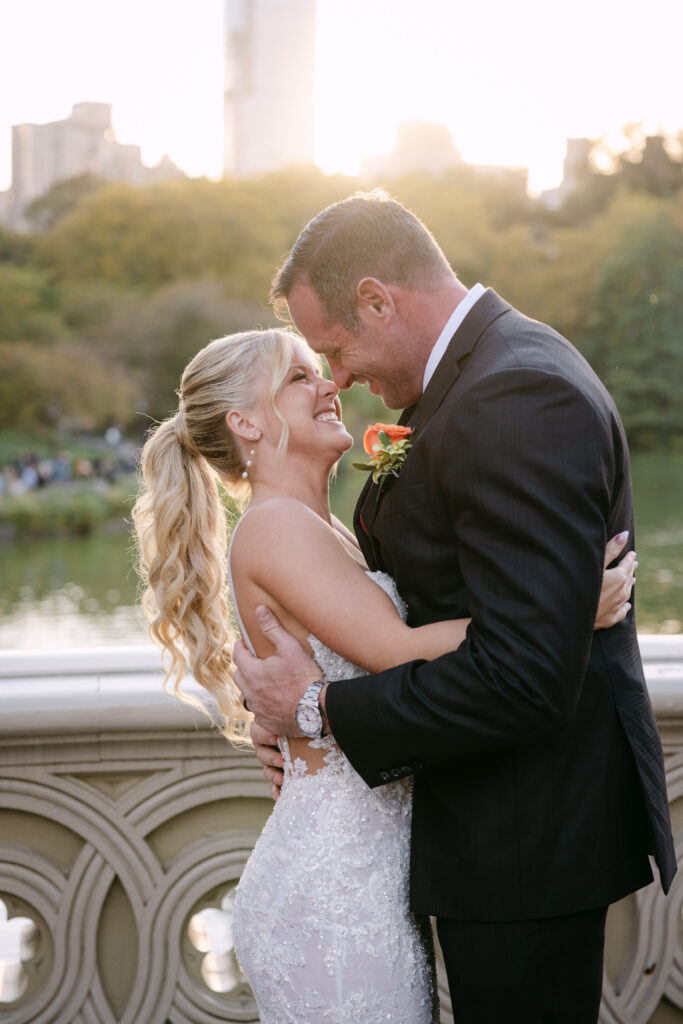 playful bride and groom moments on bow bridge during their nyc elopement