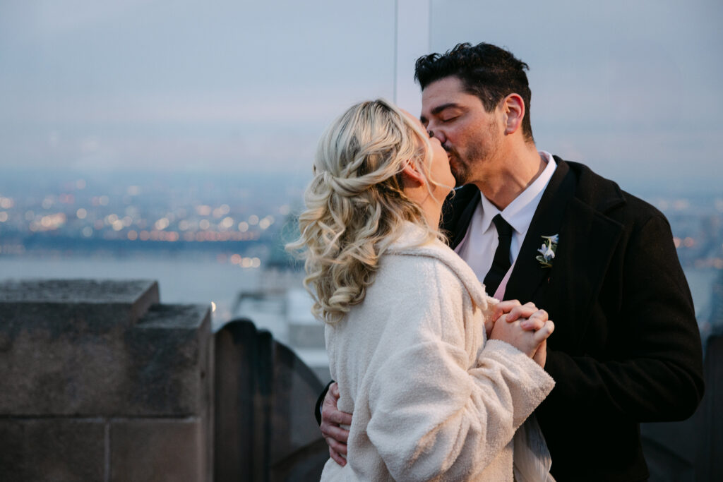 bride and groom kissing during their nyc elopement
